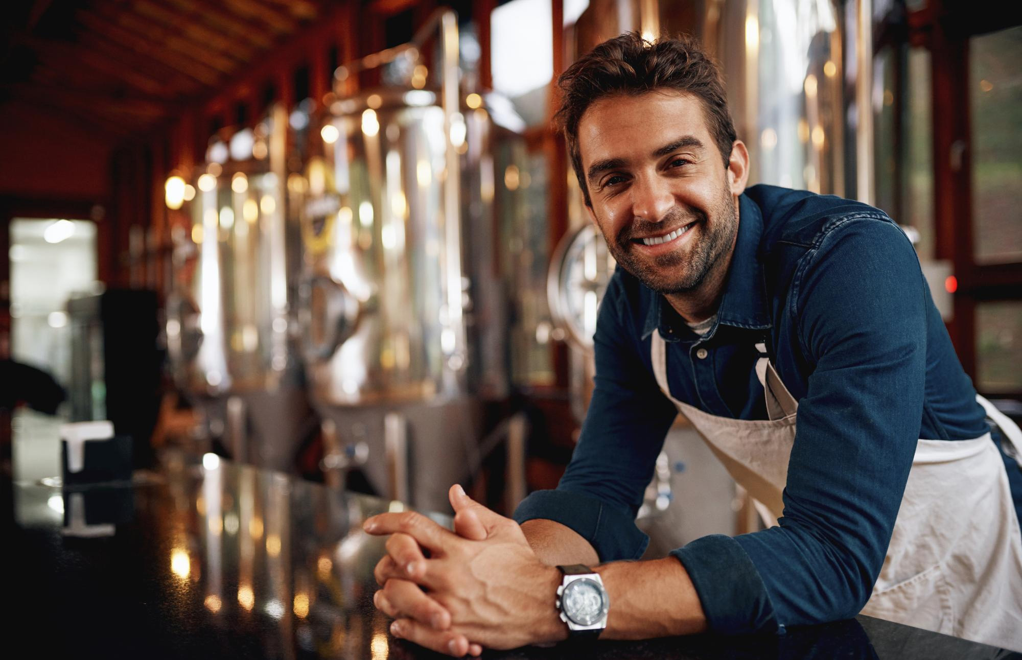 Happy bar manager